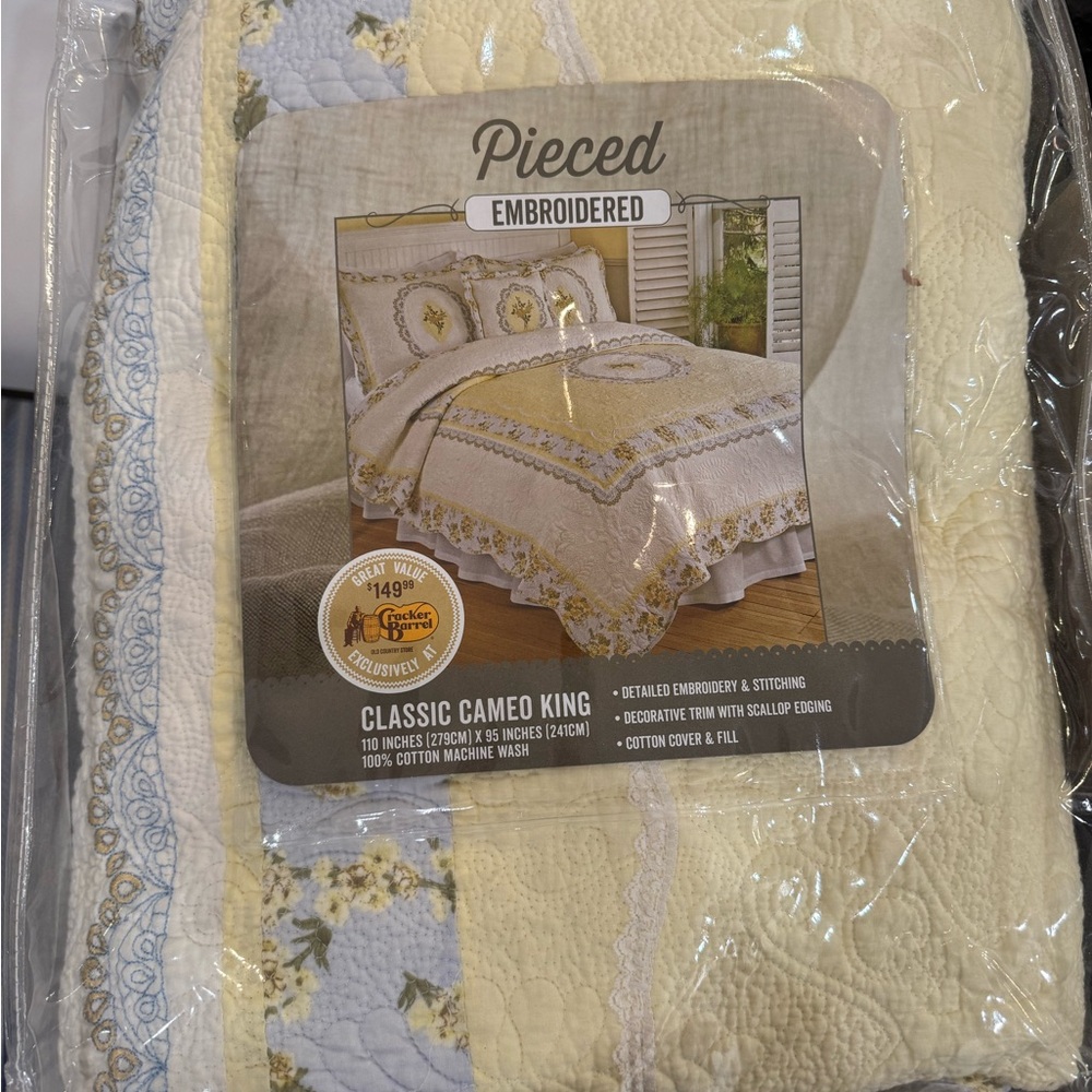 New in packaging King sized embroidered quilt.